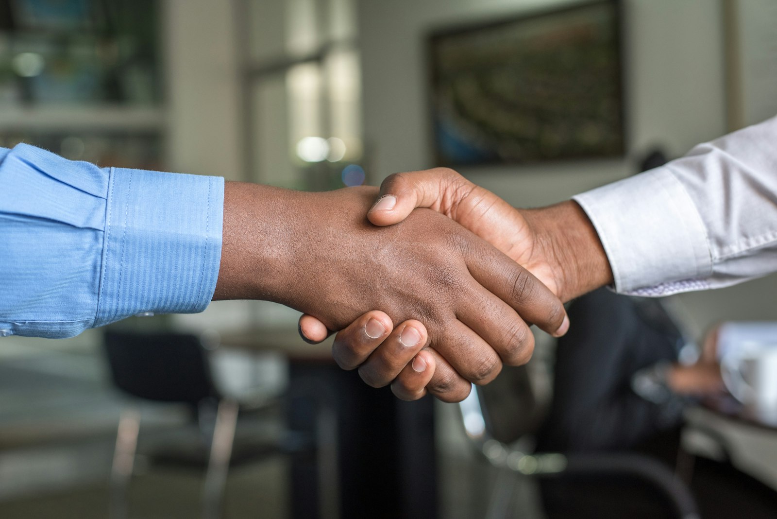 Handshake at the close of a hiring conversation