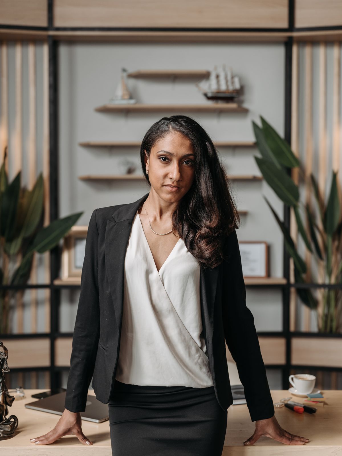 Senior professional standing in an office